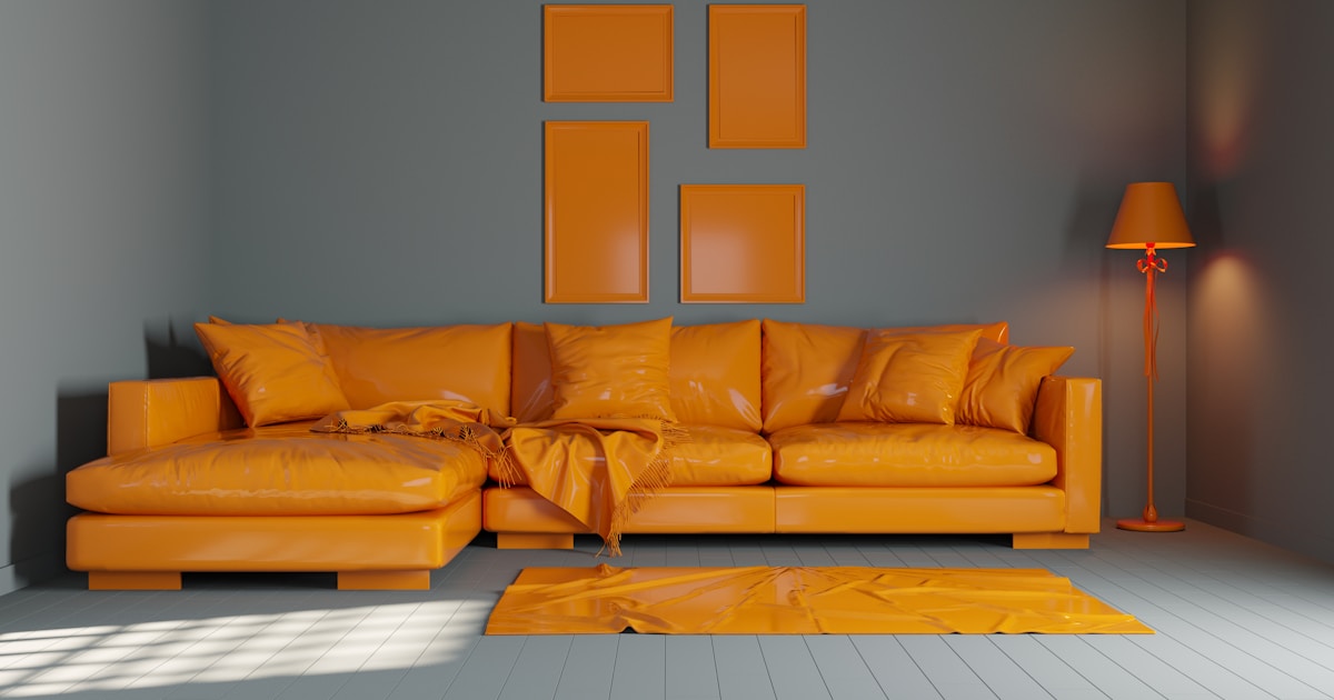 a living room with a couch and a lamp