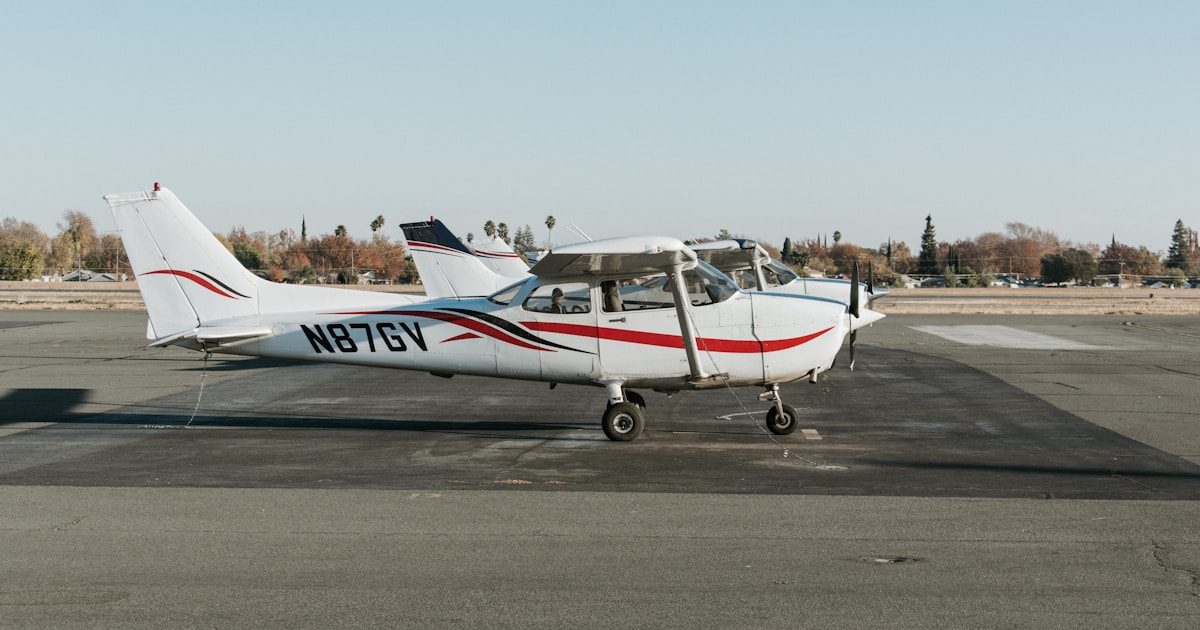 white and red aircraft