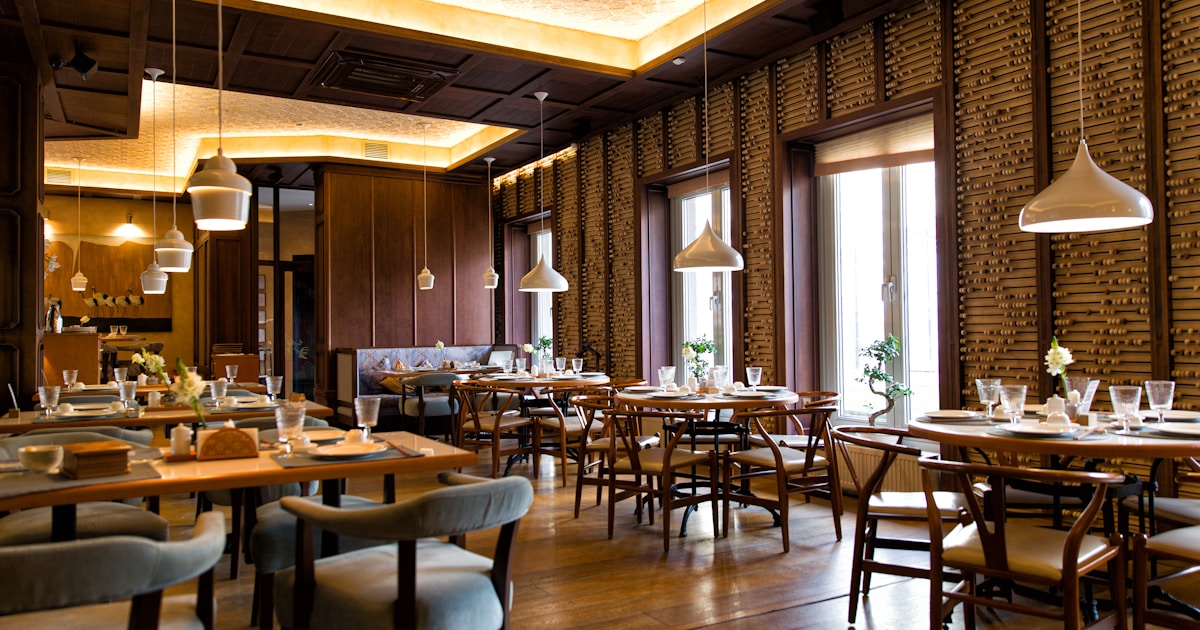 a room with tables and chairs