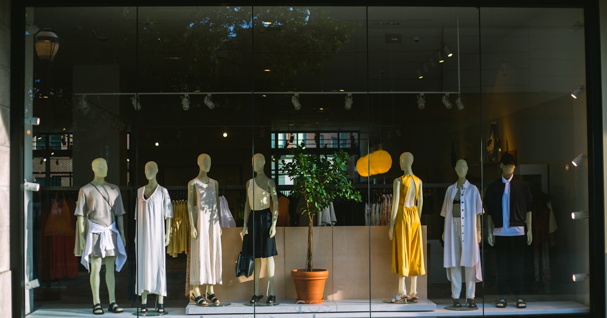 group of people in white robe standing on white floor tiles