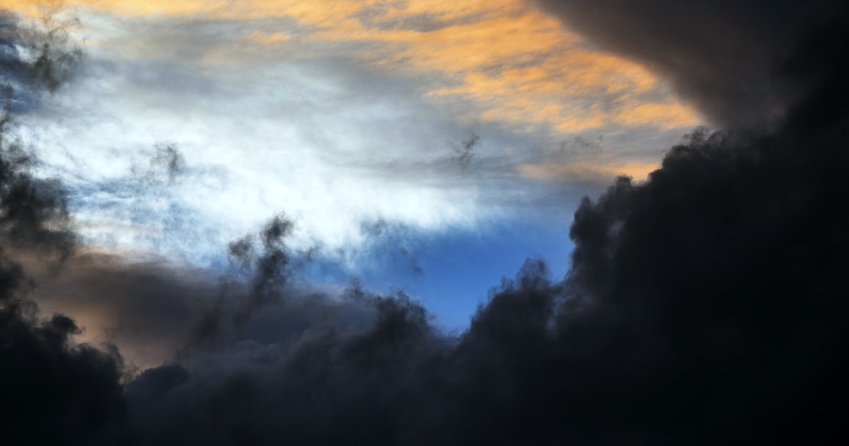 Gloomy background with dark sunset clouds. Sky overlay for photoshop and design